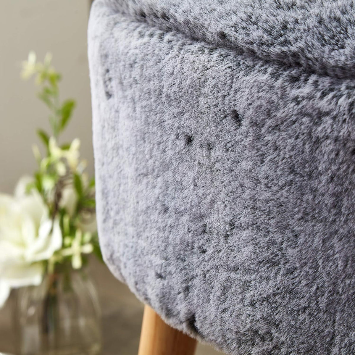 Black Faux Fur Oval Ottoman C207